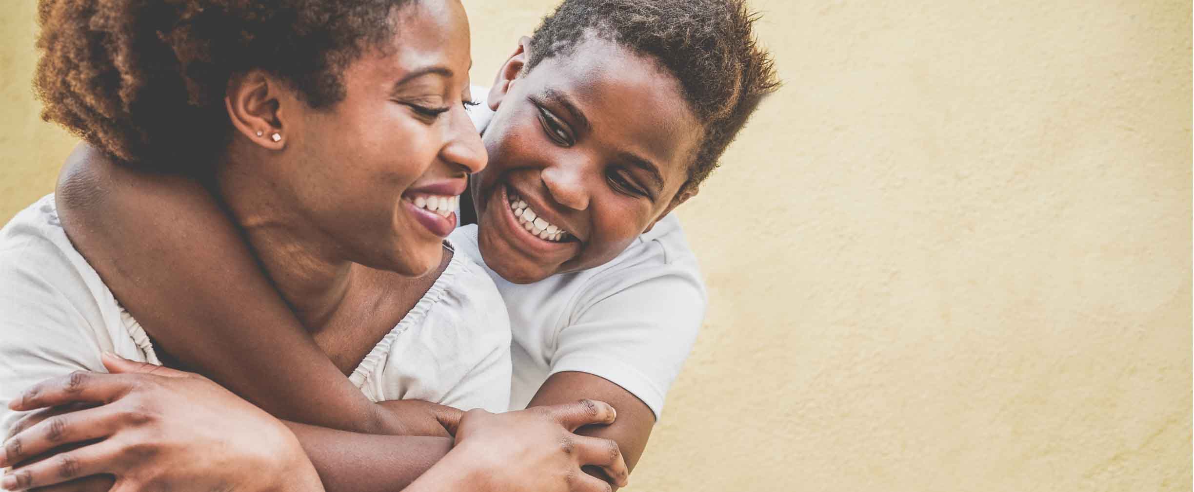 mother and son smiling