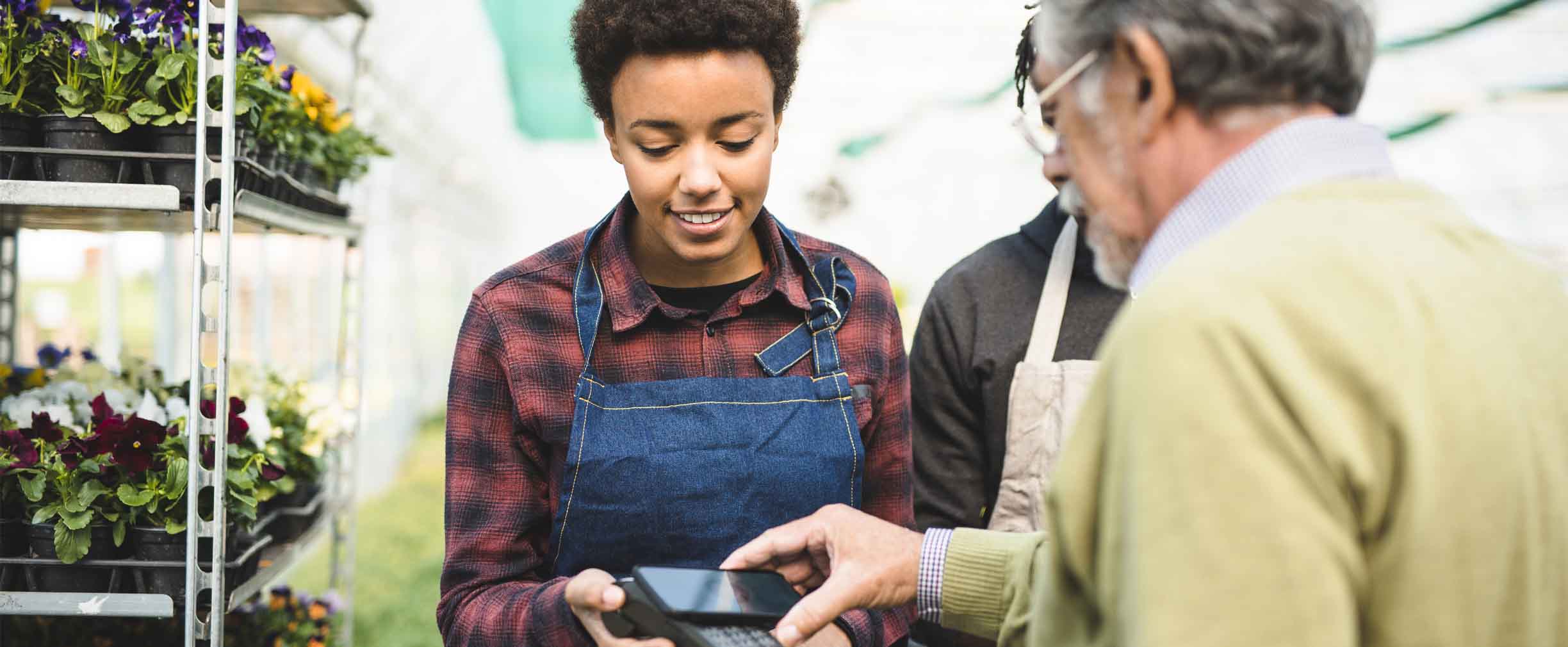 business owner using a pos system