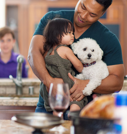 family gathered in the kitchen